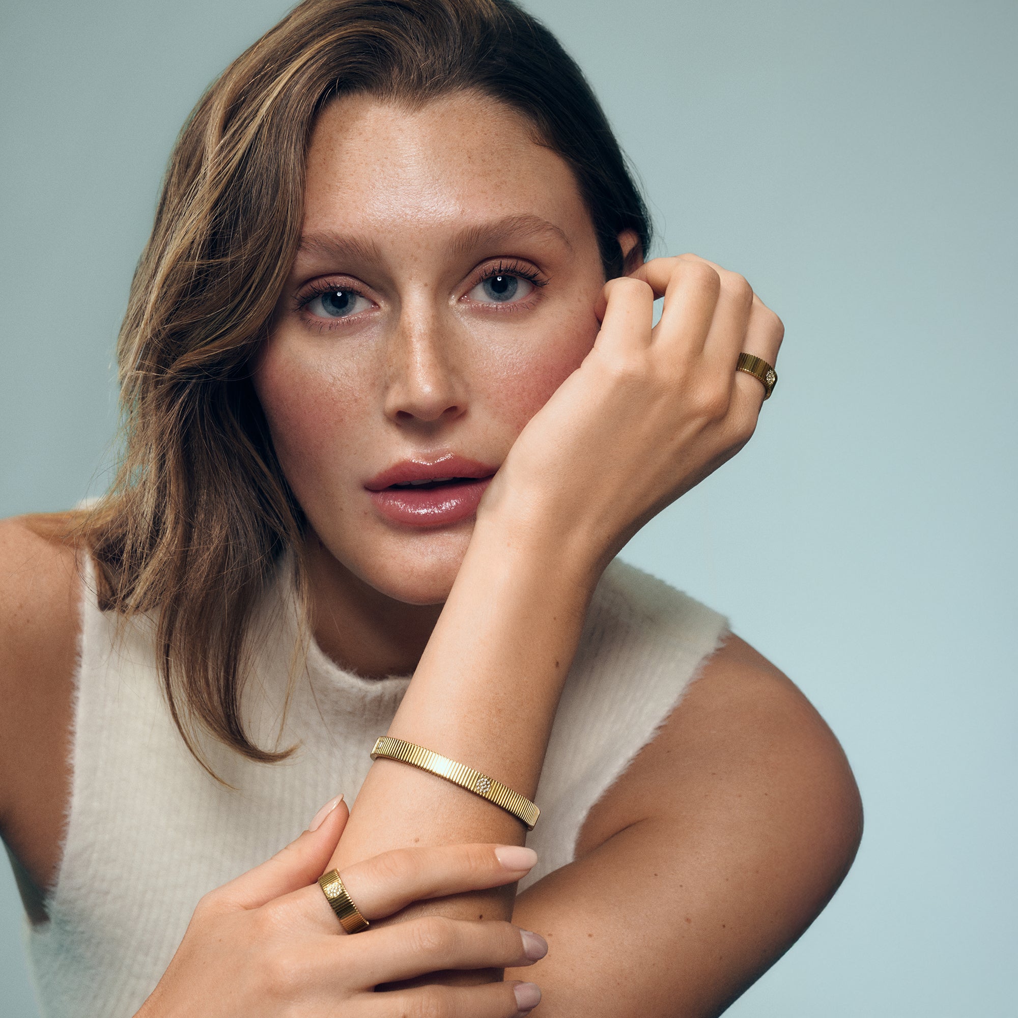 Ribbed bangle bracelet and matching band ring with pavé detail in surgical stainless steel, hypoallergenic jewelry for sensitive skin, waterproof and tarnish free.