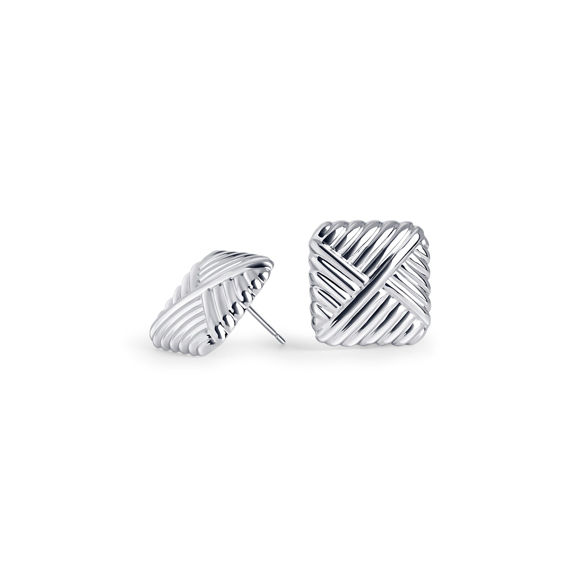 Silver stainless steel textured stud earrings with woven sculptural design, bold modern jewelry, hypoallergenic non-tarnish durable earrings, elegant statement everyday jewelry.
